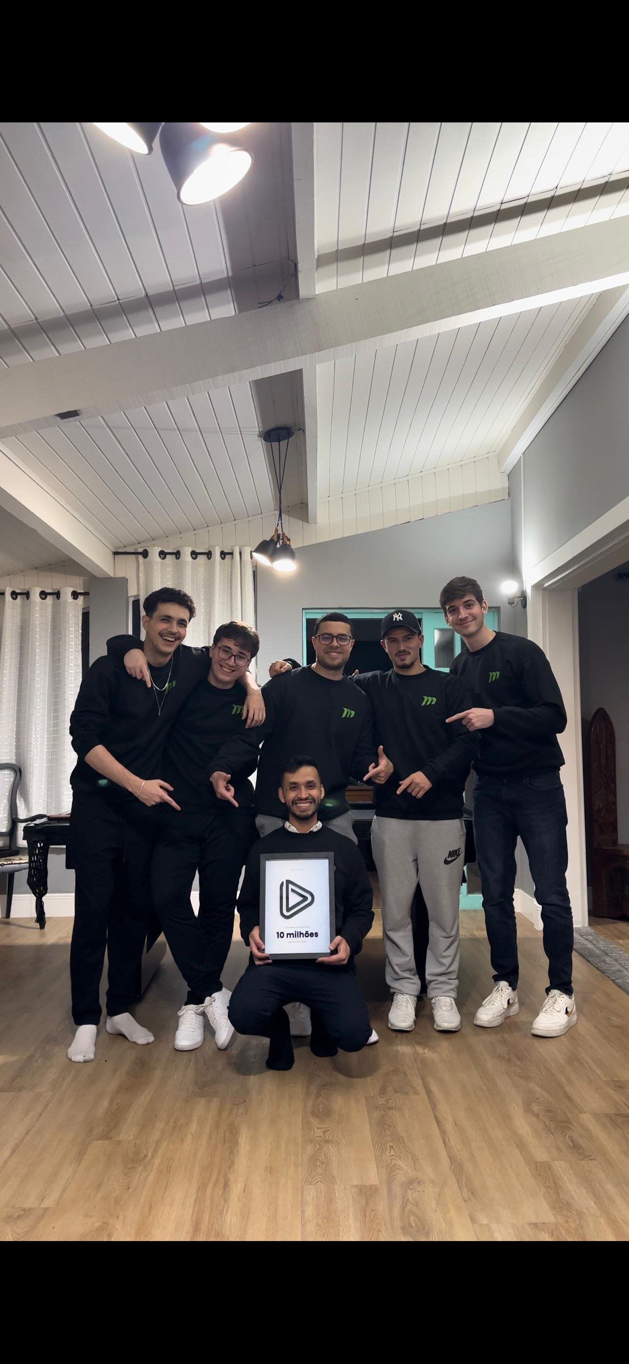 Grupo Mega team celebrating an award